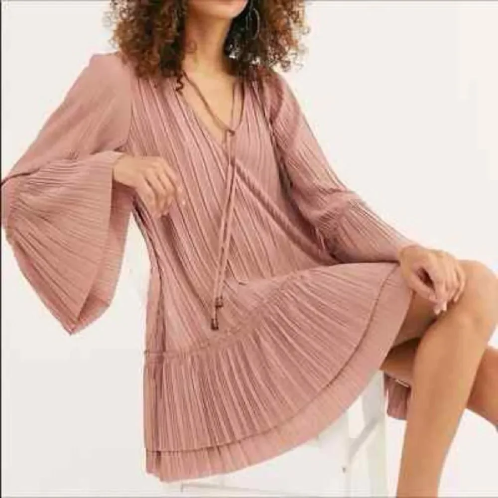 Revolve Free People Can’t Help It Pleated Ruffle Mini Dress in Dusty Rose
